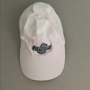 A Seattle Thunderbirds white hockey hat.